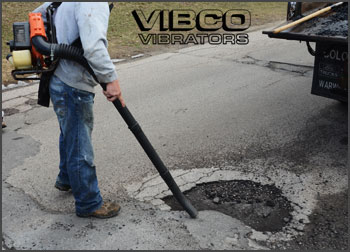 cleaning out a pothole